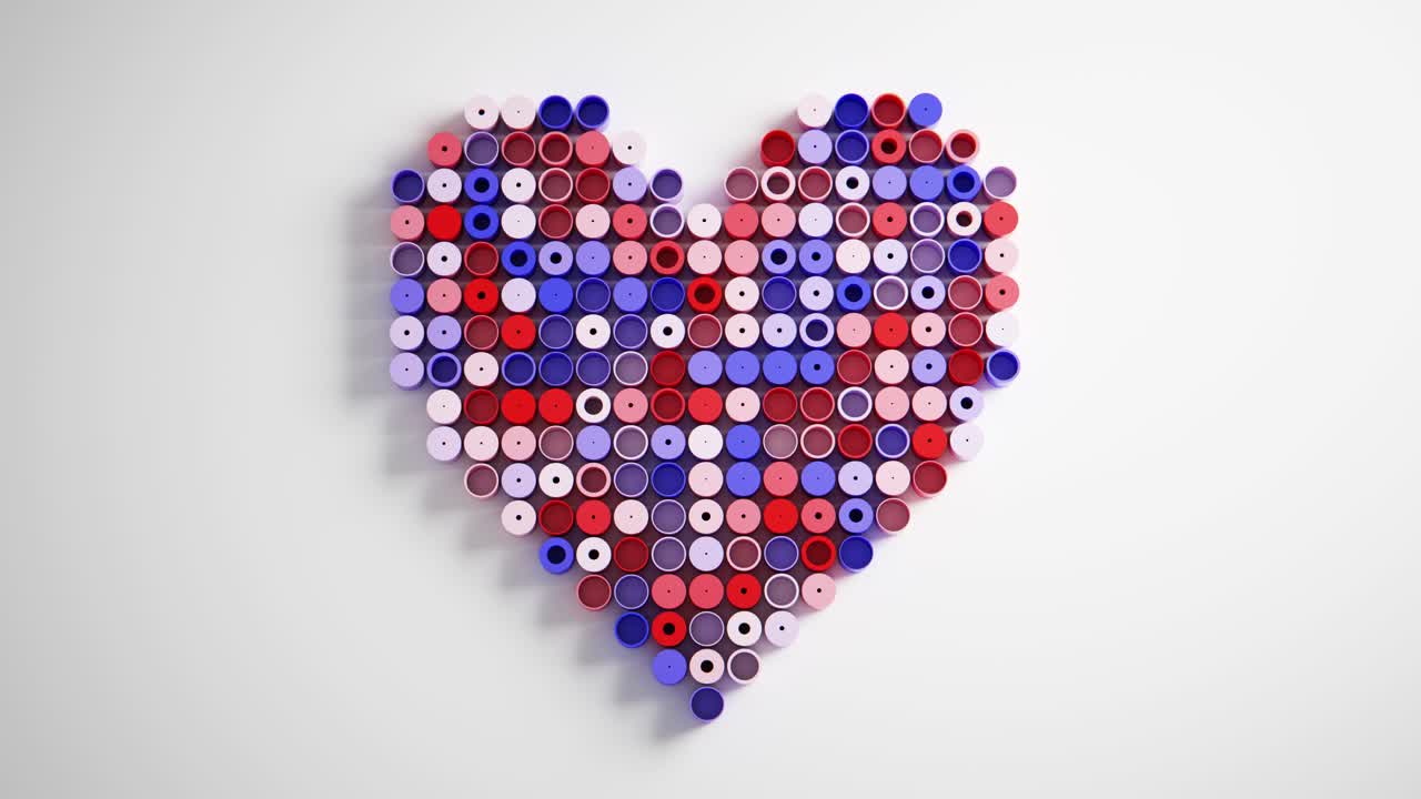 Forma di cuore dinamica fatta di cilindri colorati rotanti