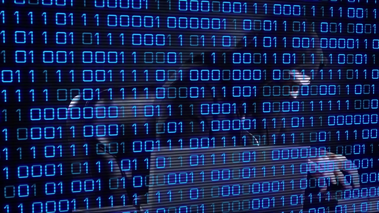 Animation of data processing over caucasian male hacker using laptop