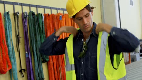 male worker wearing his uniform at solar station 4k