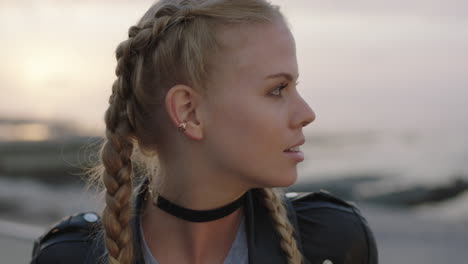 portrait-of-attractive-confident-blonde-woman-looking-around-wearing-leather-jacket-braided-hairstyle