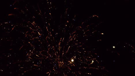 close aerial footage of fireworks being shot into the sky