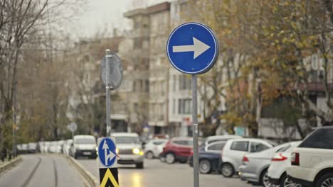 highway traffic, parking, sidewalk, sign, trees