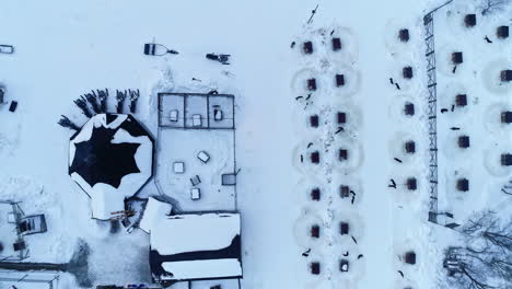 Top-view-of-dog-houses-with-dogs-at-the-Snow-hotel-Kirkenes-Norway