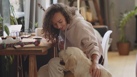 woman and her dog at home