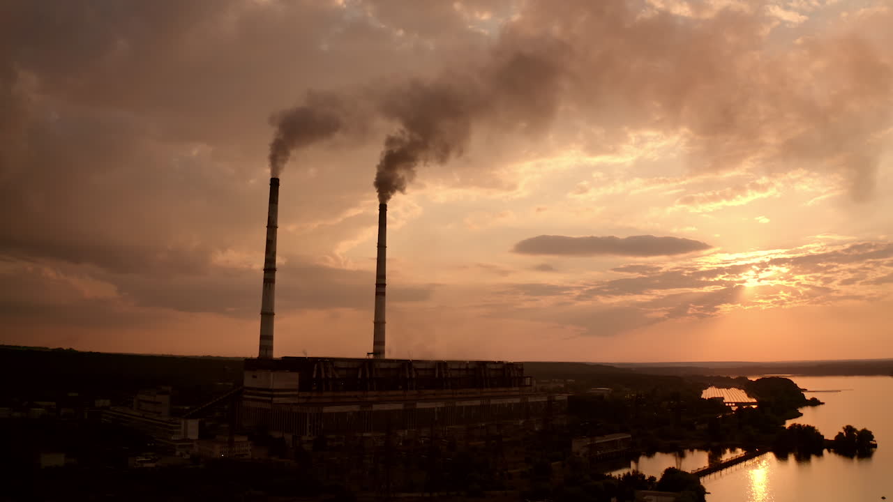 Industry factory gas tubes on sunset. Factory construction engineering.