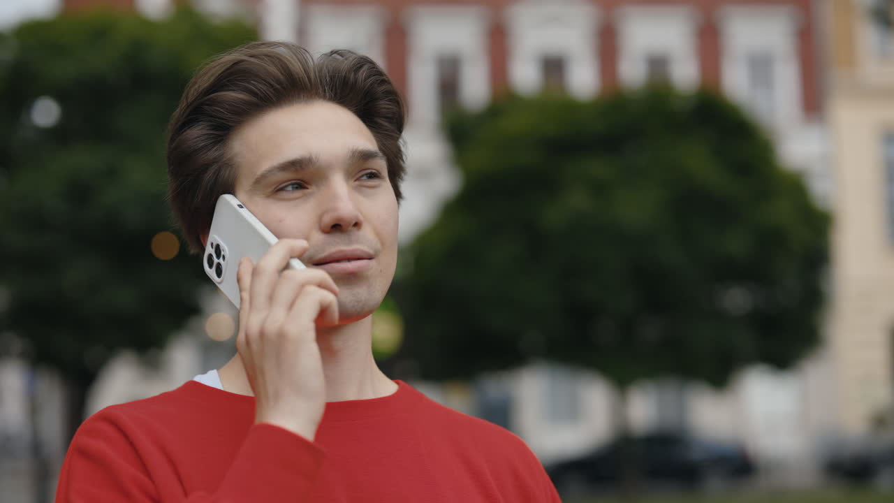 Man on phone outdoors