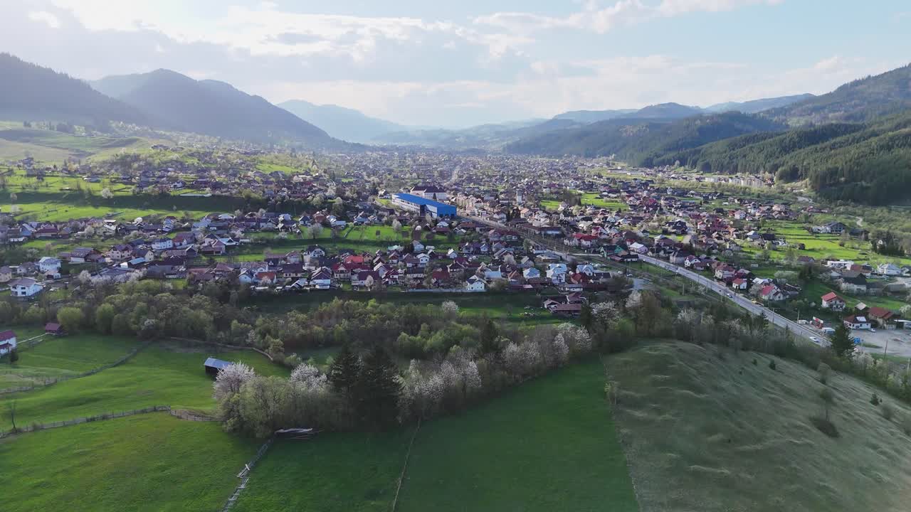 Drone view of Campulung city and the green nature around the city