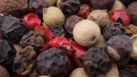 Macro-close-up-Mixed-peppercorns.-Dry-mix-peppercorns-close-up