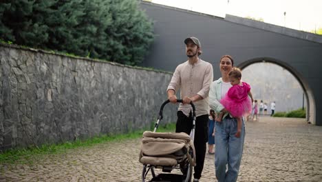 happy family walking in the park