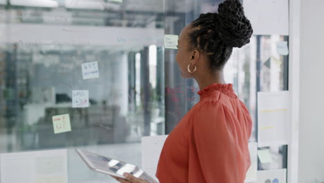 a-young-businesswoman-using-a-digital-tablet