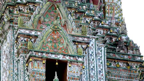 close-up views of wat arun's ornate architecture