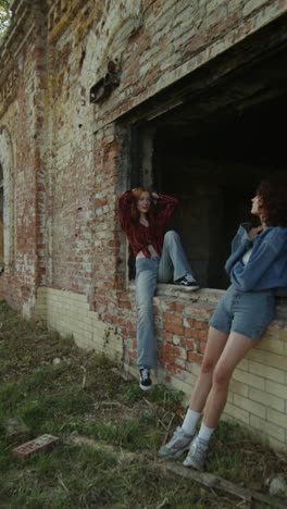 two friends relaxing in an abandoned building