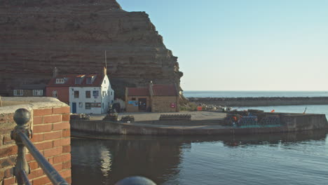 North-York-Moors,-Staithes-Clip-10a,-PAN-Staithes-Harbour-and-Cowbar-Nab,-North-Yorkshire-Heritage-Coast,-Video,-4096x2160-25fps,-Prores-422