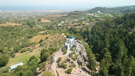 Panoramic-Aerial-View-Of-Agios-Ioannis-Theologos-Church-On-Hilltop-In-Kos-Island,-Greece