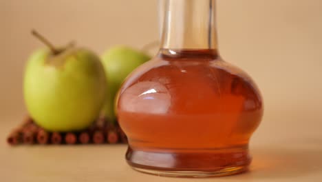 apple cider vinegar with apples