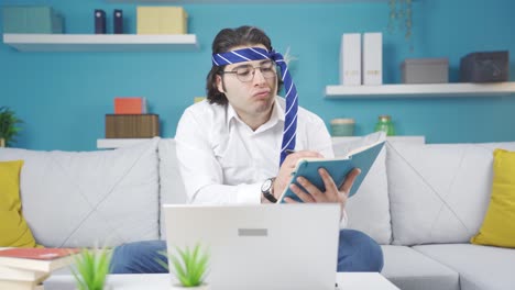 Home-office-worker-funny-man.-He-is-dancing-while-working-on-the-laptop.