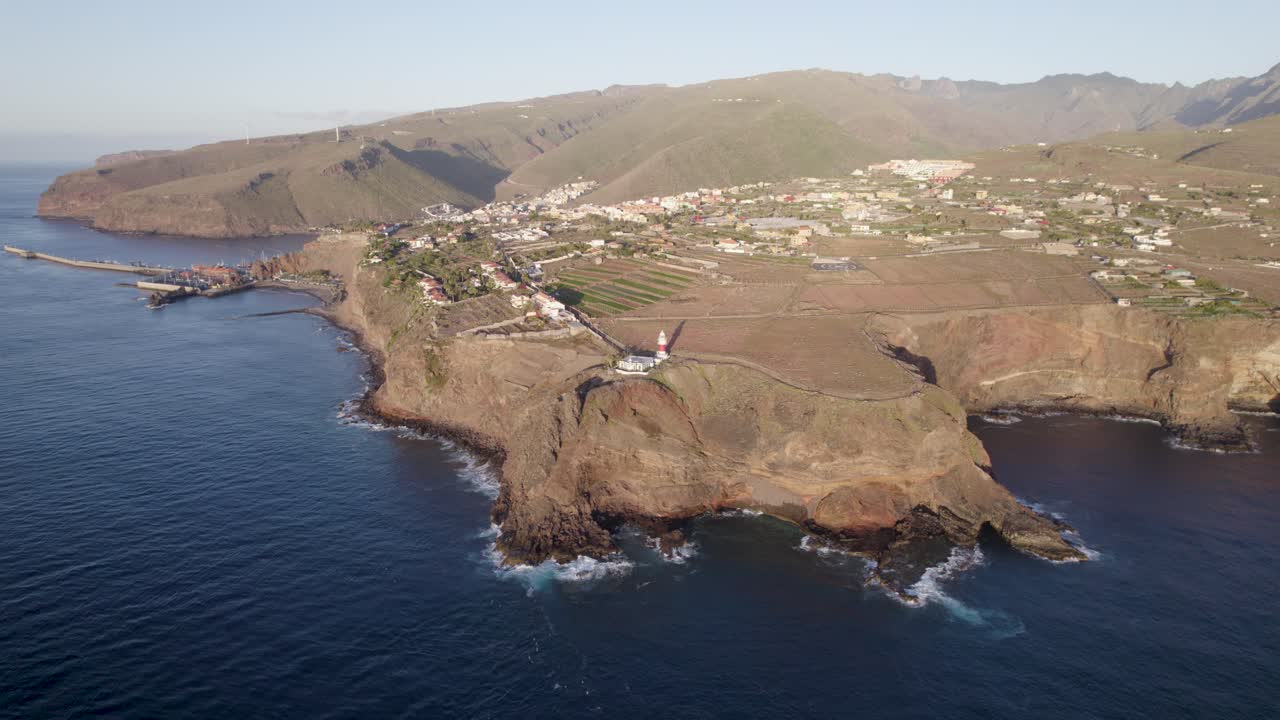 Drone view of El Faro de San Sebastian, the lighthouse of the island of La Gomera, one of the canary island group.