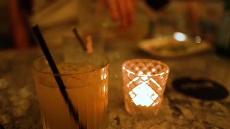 cocktails and candles at a restaurant