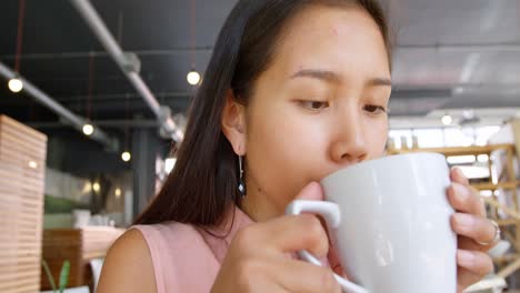 teenage girl drinking coffee 4k