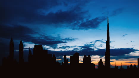 dubai skyline silhouette at sunset