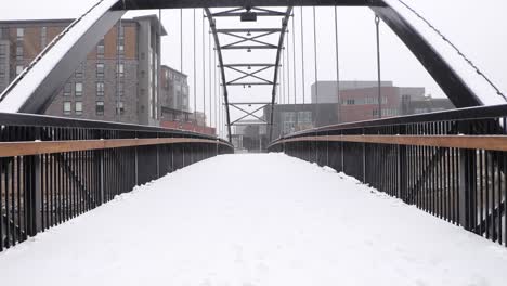 Snow-covered-city-bridge-during-fresh-snowfall