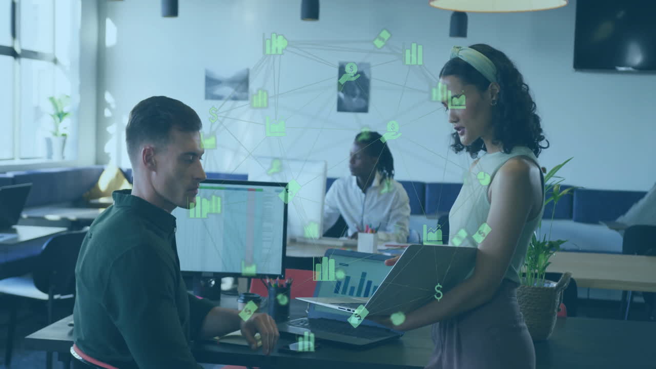 Discussing data, business professionals with animation overlay in modern office