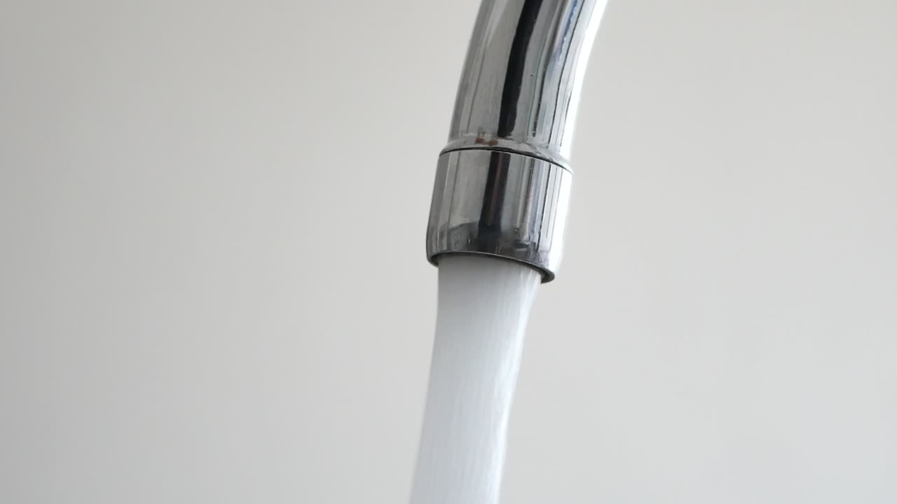 Water flowing from a faucet
