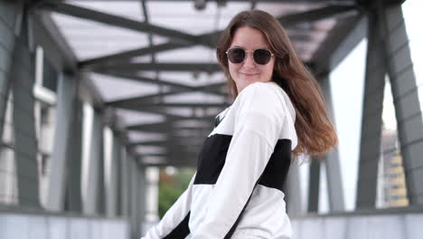 Woman walking on a bridge