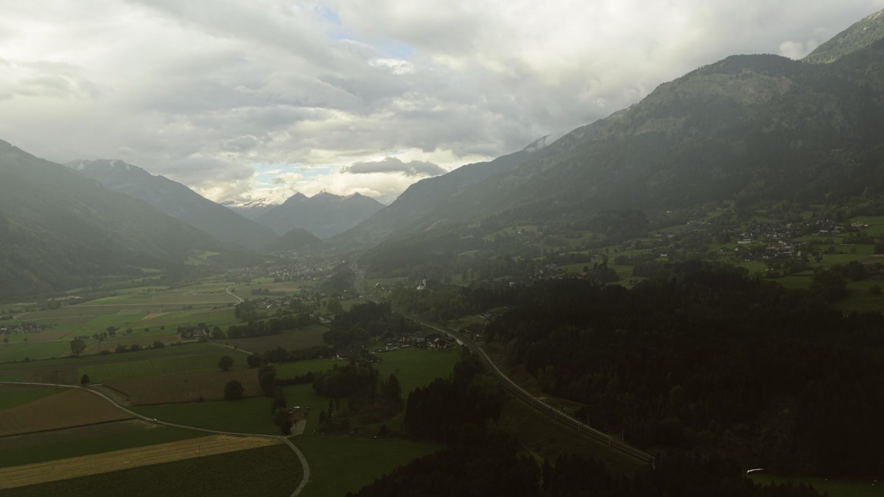 Establishing drone shot of the scenic Draun Valley under cloudy skies of Tyrol