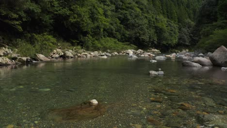 pristine itadori river in the mountains of gifu japan