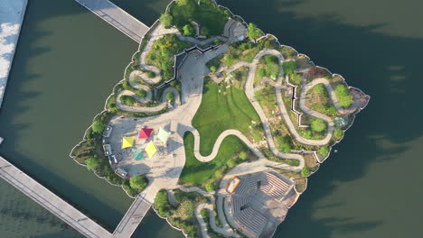 a top down shot directly above a park known as little island in nyc on a sunny morning