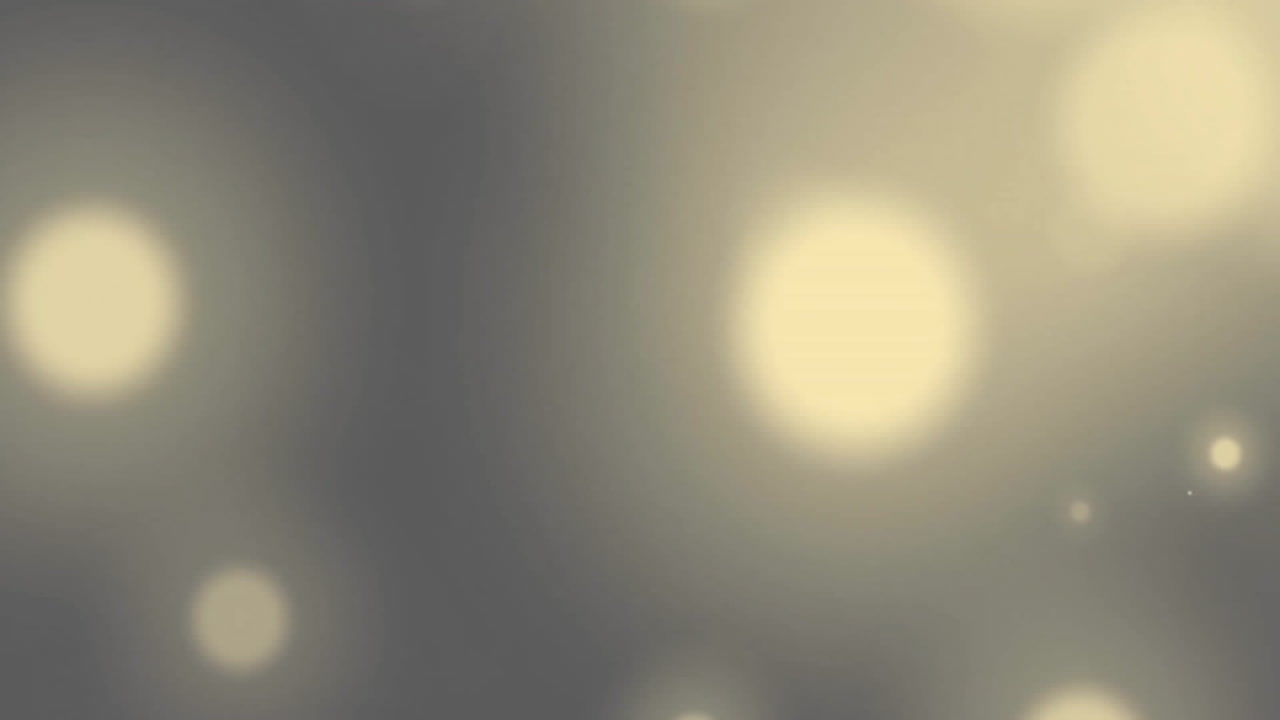 Animation of light spots on black background