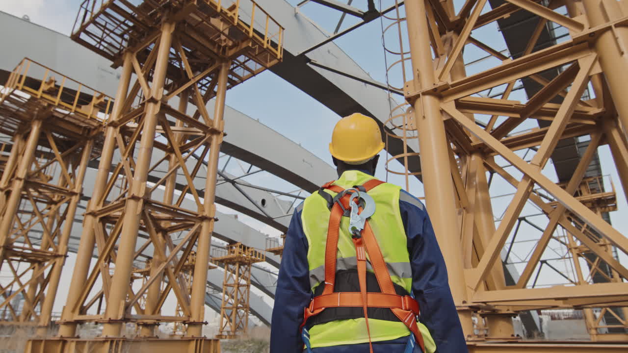 Rear View of Construction Worker Outside