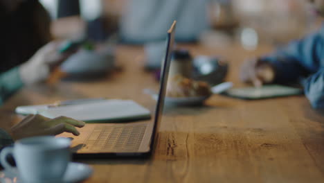 close-up-business-people-hands-using-digital-computer-technology-in-cafe-browsing-working-brainstorming-sharing-creative-ideas-studying-online-research-enjoying-busy-coffee-shop