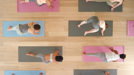 Health,-training-and-yoga-class-overhead-by-woman