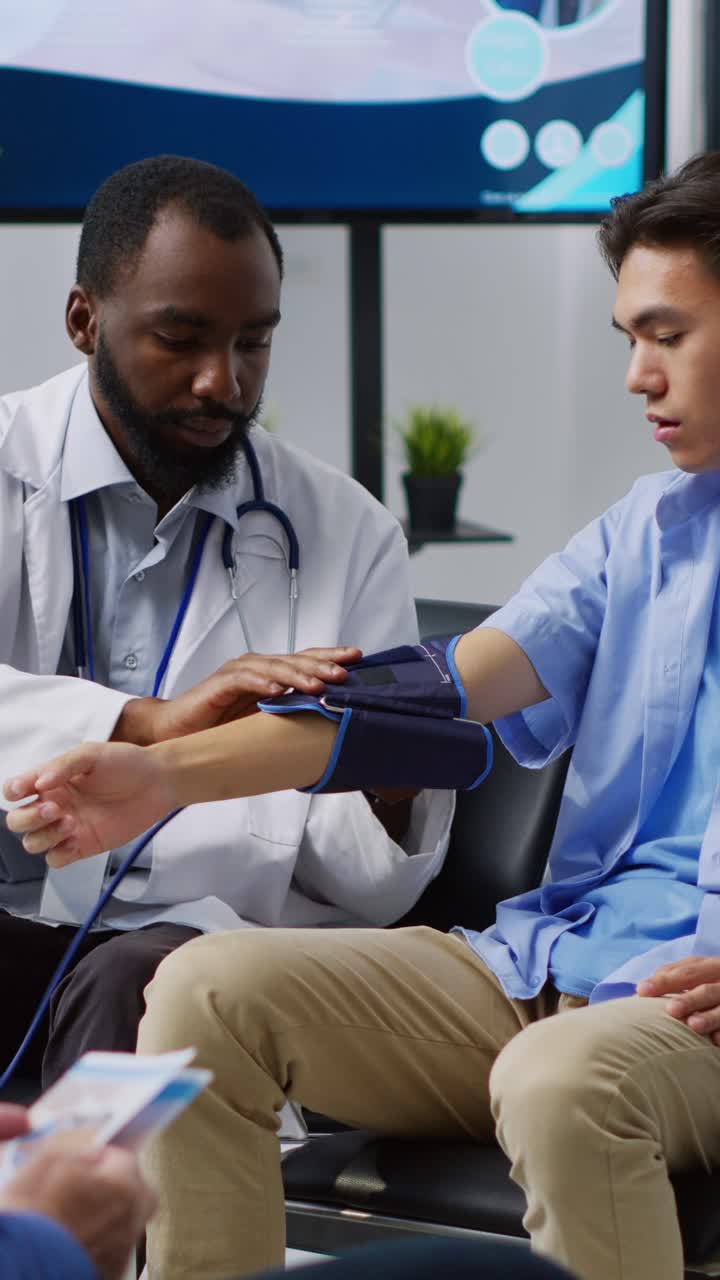 Vertical video: Physician doing insulin level measurement