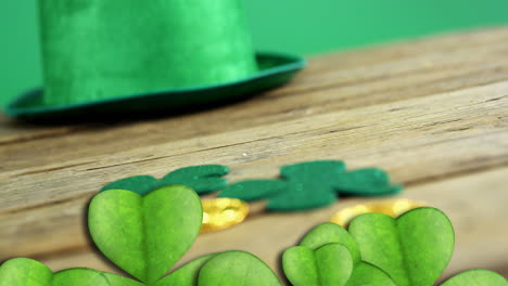 animación del día de san patricio trébol y sombrero verde sobre fondo verde.