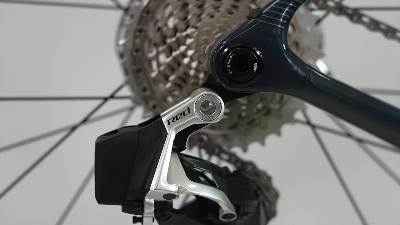 Close-up of a bicycle rear derailleur and cassette