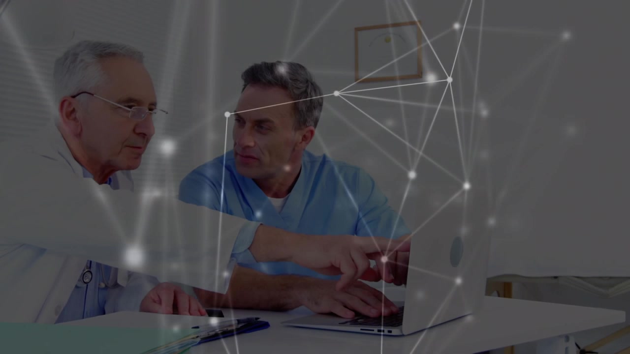 Animation of network of connections over businessman using laptop