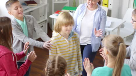 six kids playing trust game during psychological training