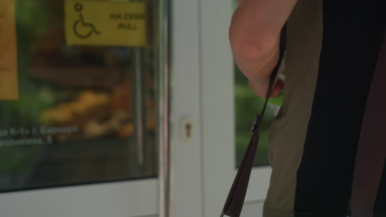 Young Man At Clinic Door, White Male Standing By Entrance, Young Man Prepares To Open Glass Door Outdoors, An Anxious Young Man Stands With Hand On Metal Handle Outside Clinic Entrance
