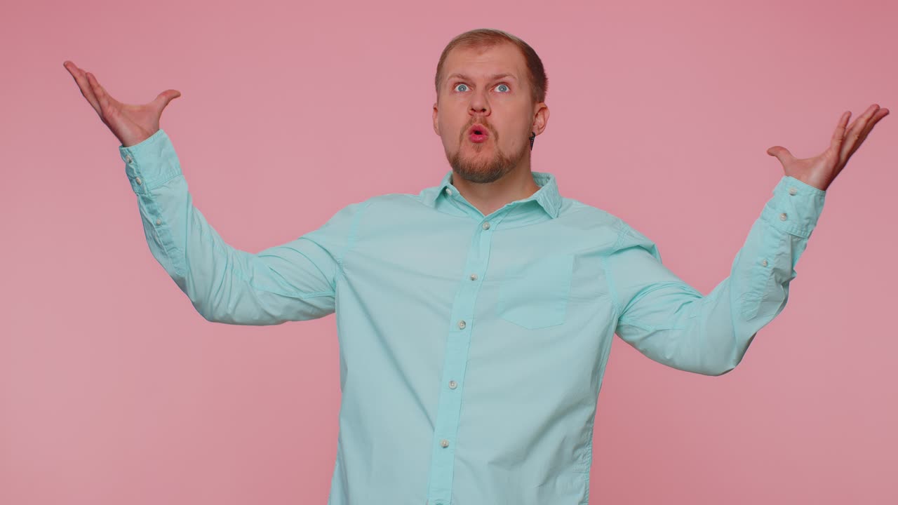 Excited amazed man showing head explosion looking worried shocked surprised guy wow idea eureka