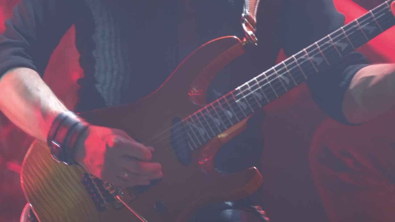 Guitarist Performing on Stage