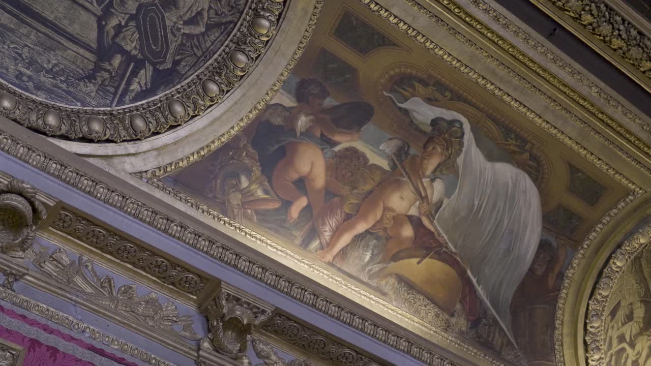 Ceiling mural in the Palace of Versailles showcasing a classical allegorical scene