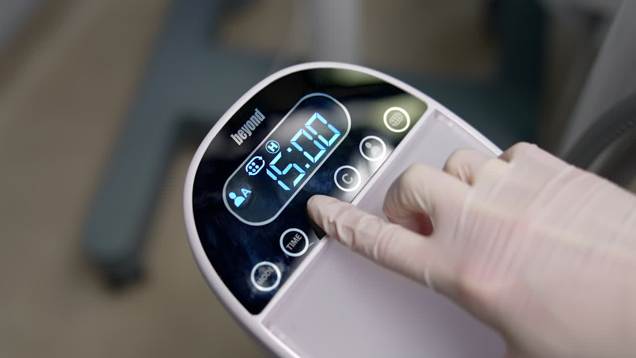 Female dentist in action. Woman dentist working in dental clinic