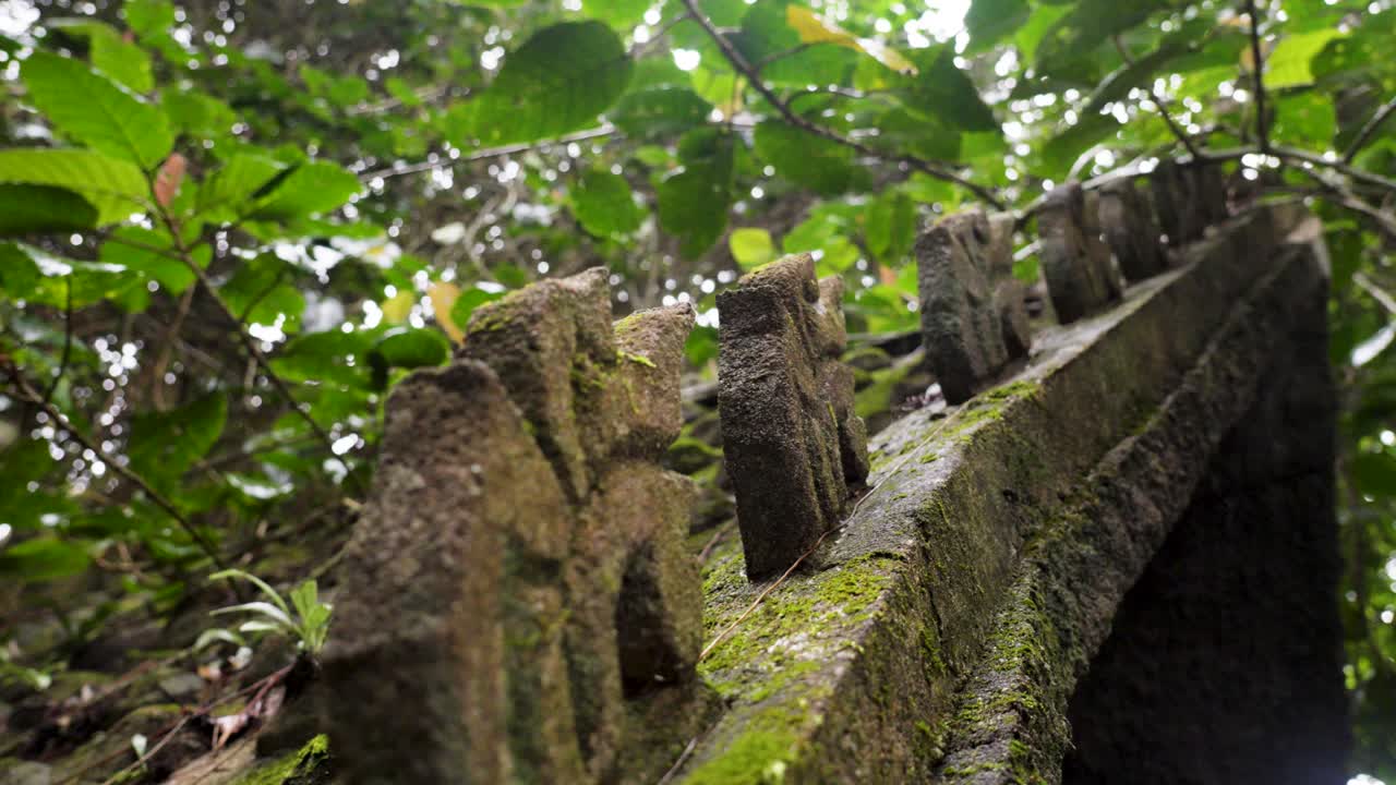 Historical architectural structure standing in the forest of Koh Samui, Thailand.