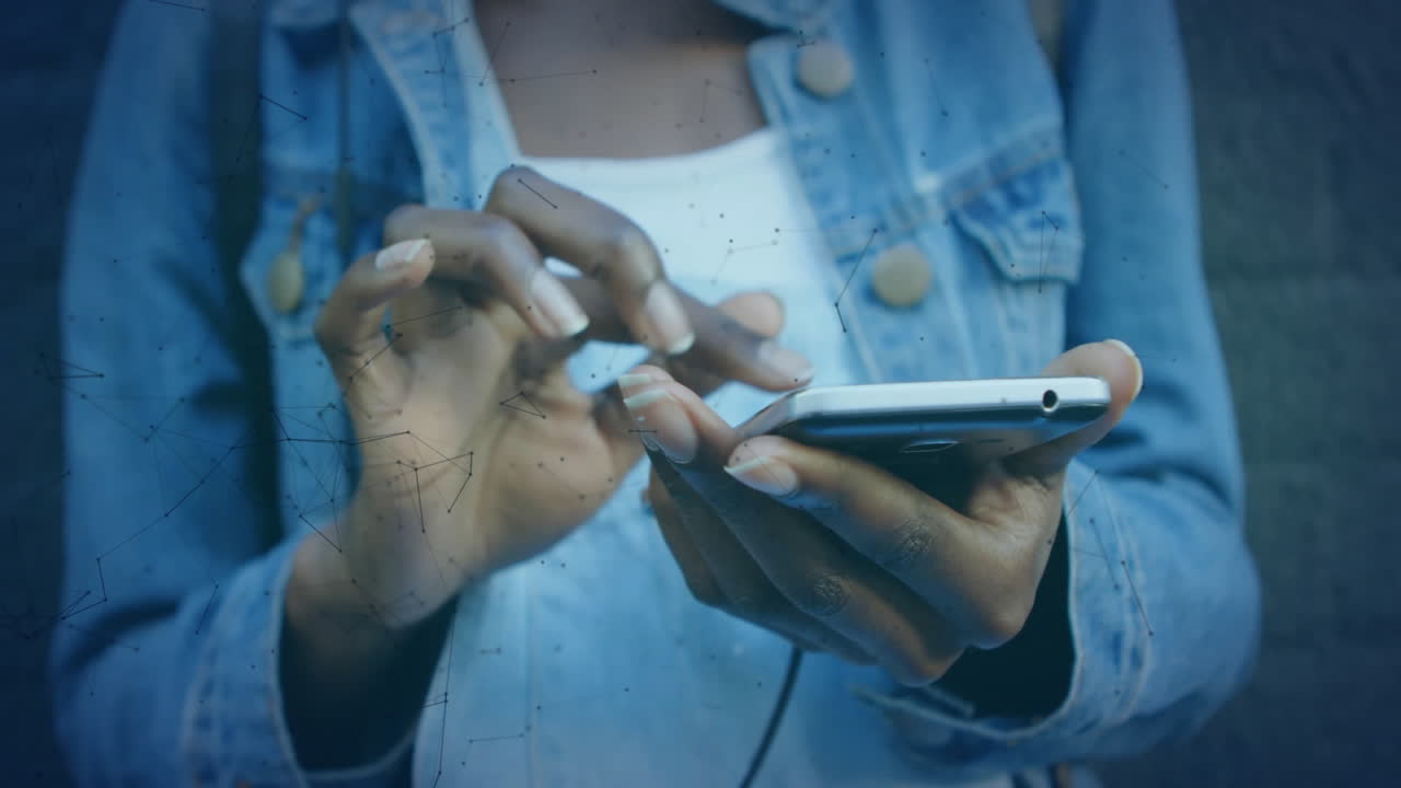 Using smartphone, hands connecting to digital network with overlay animation