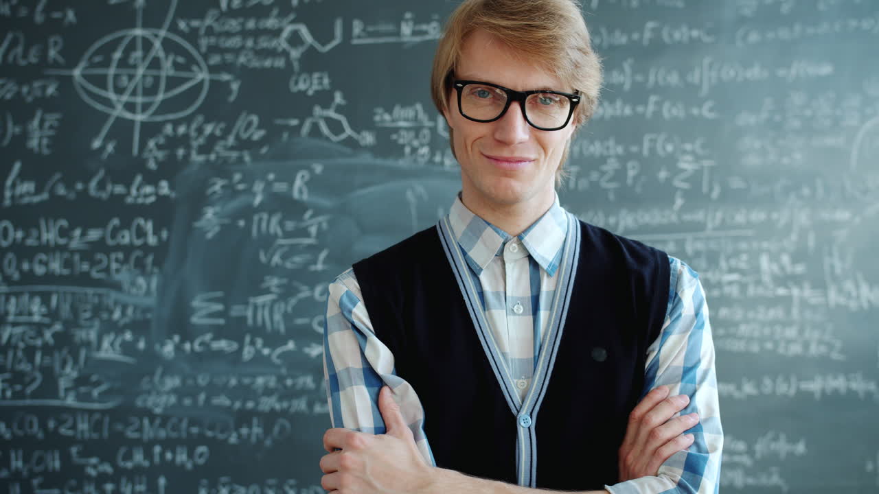 Smiling Man in a Classroom
