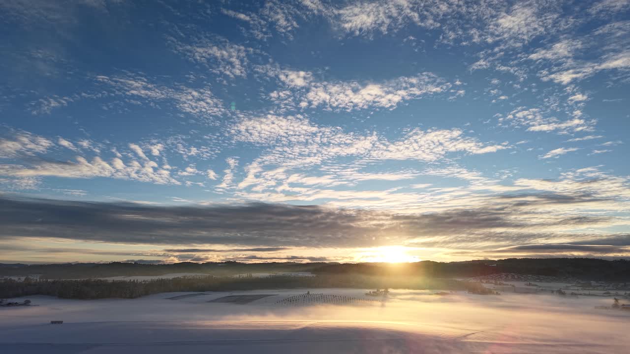 Drone shots by dji air 3s. Swiss winter wonderland sunrise.