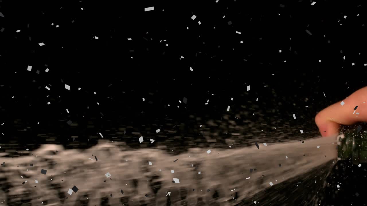 Right-hand tilting bottle, drops turning into jet, foamy spray showing pour on black with squares